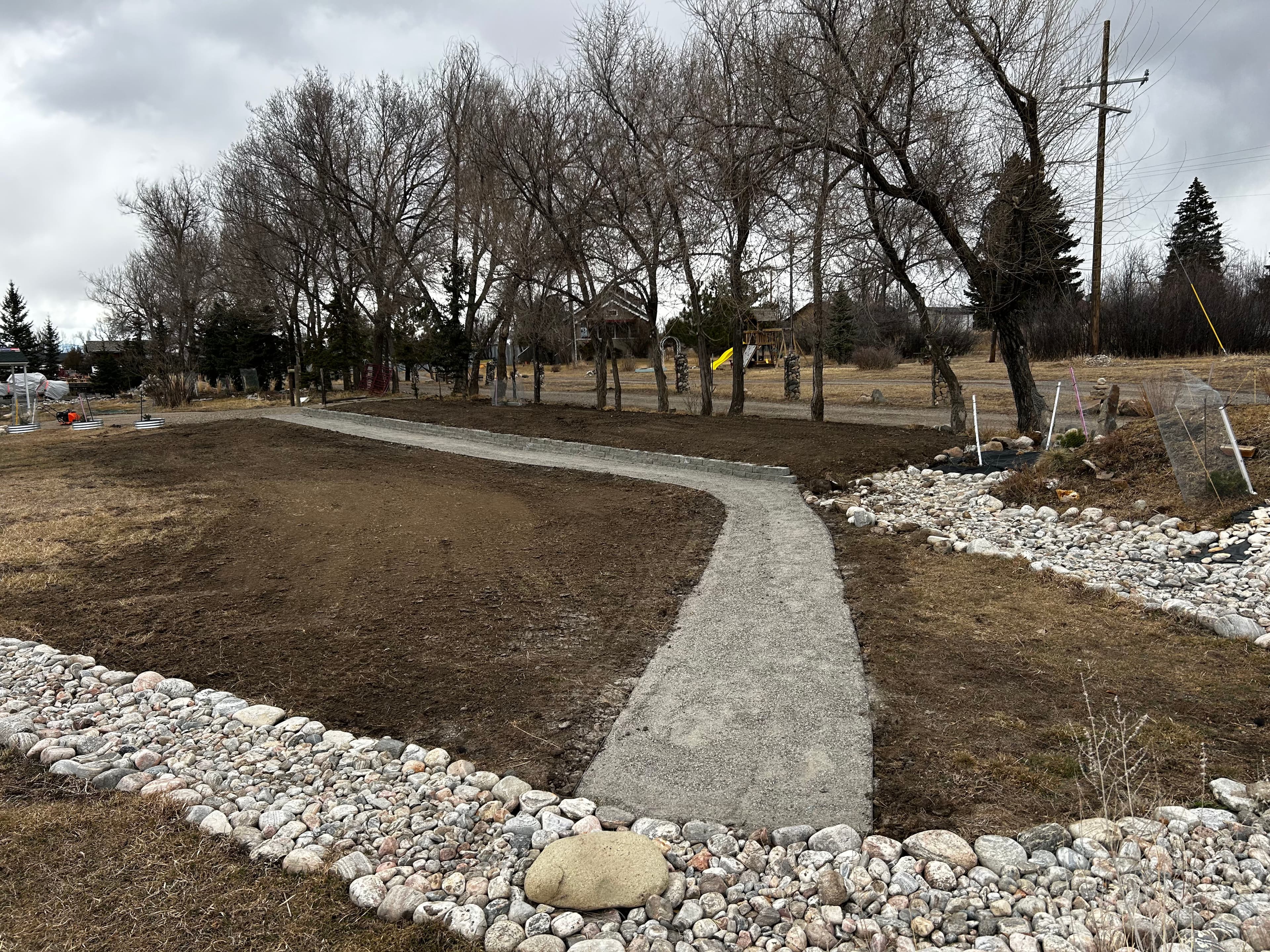 Project Property Enhancement with Drainage and Pathway Construction in Gallatin Valley image