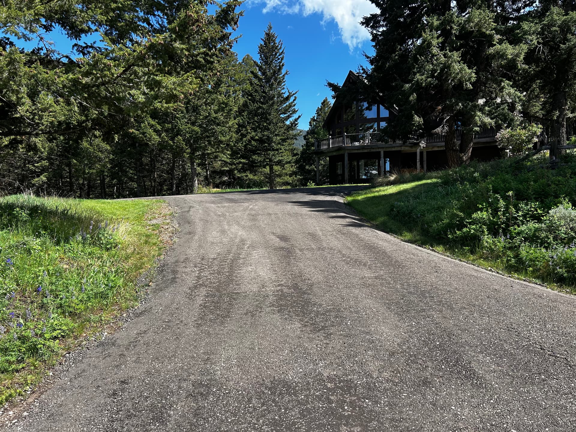 Loose Gravel Driveway Gets a Solid Asphalt Millings Upgrade